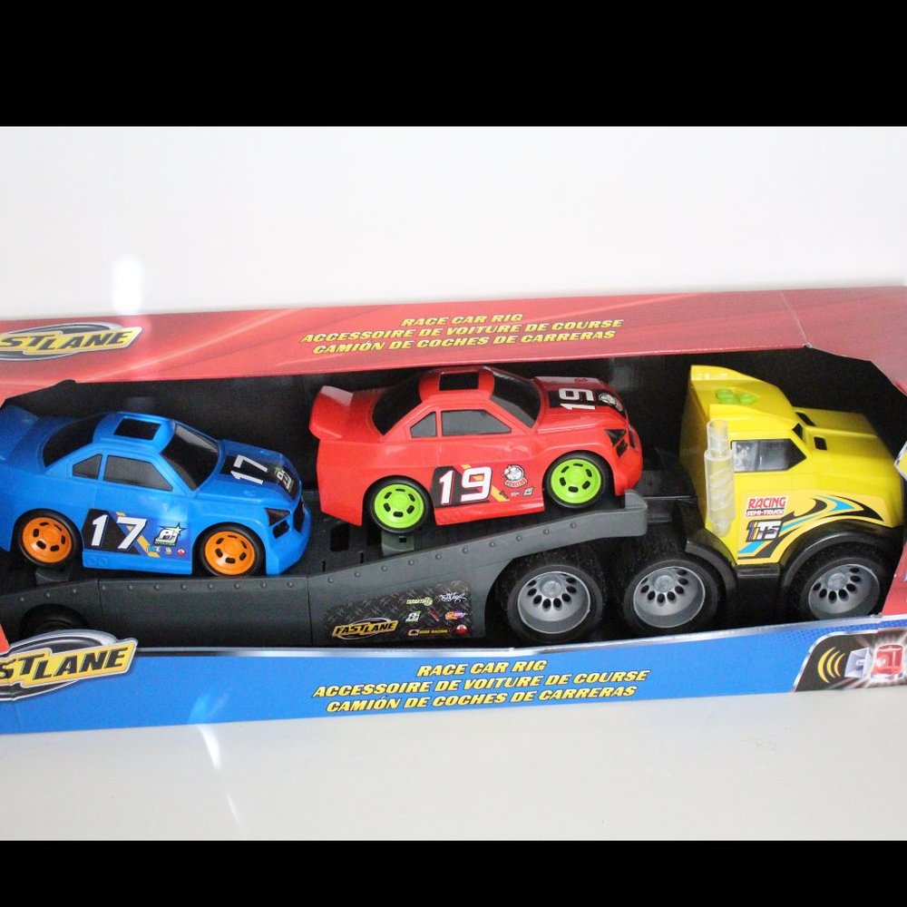NIB FAST LANE RACE CAR RIG